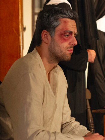 Father Schiller (Joe Coghlan)